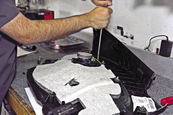 Apply Dynamat sound deadening material to cover as much of the inner side of the door skin as possible. This will help to reduce sound vibrations and outside noise from the passenger cabin